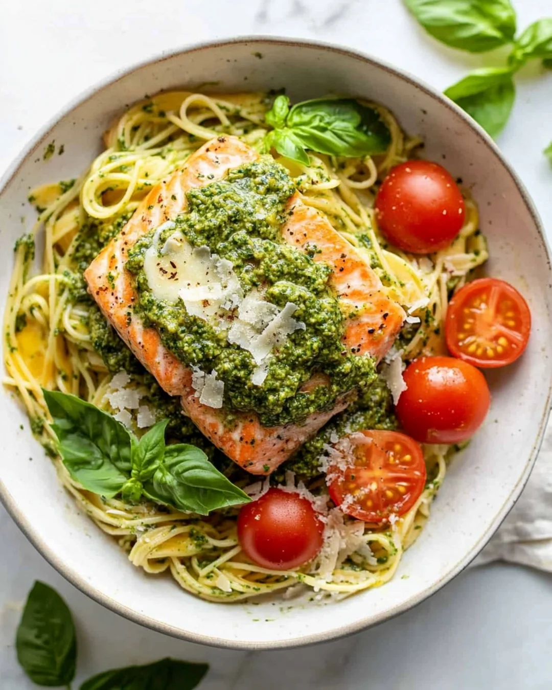 Creamy salmon pesto pasta on a plate